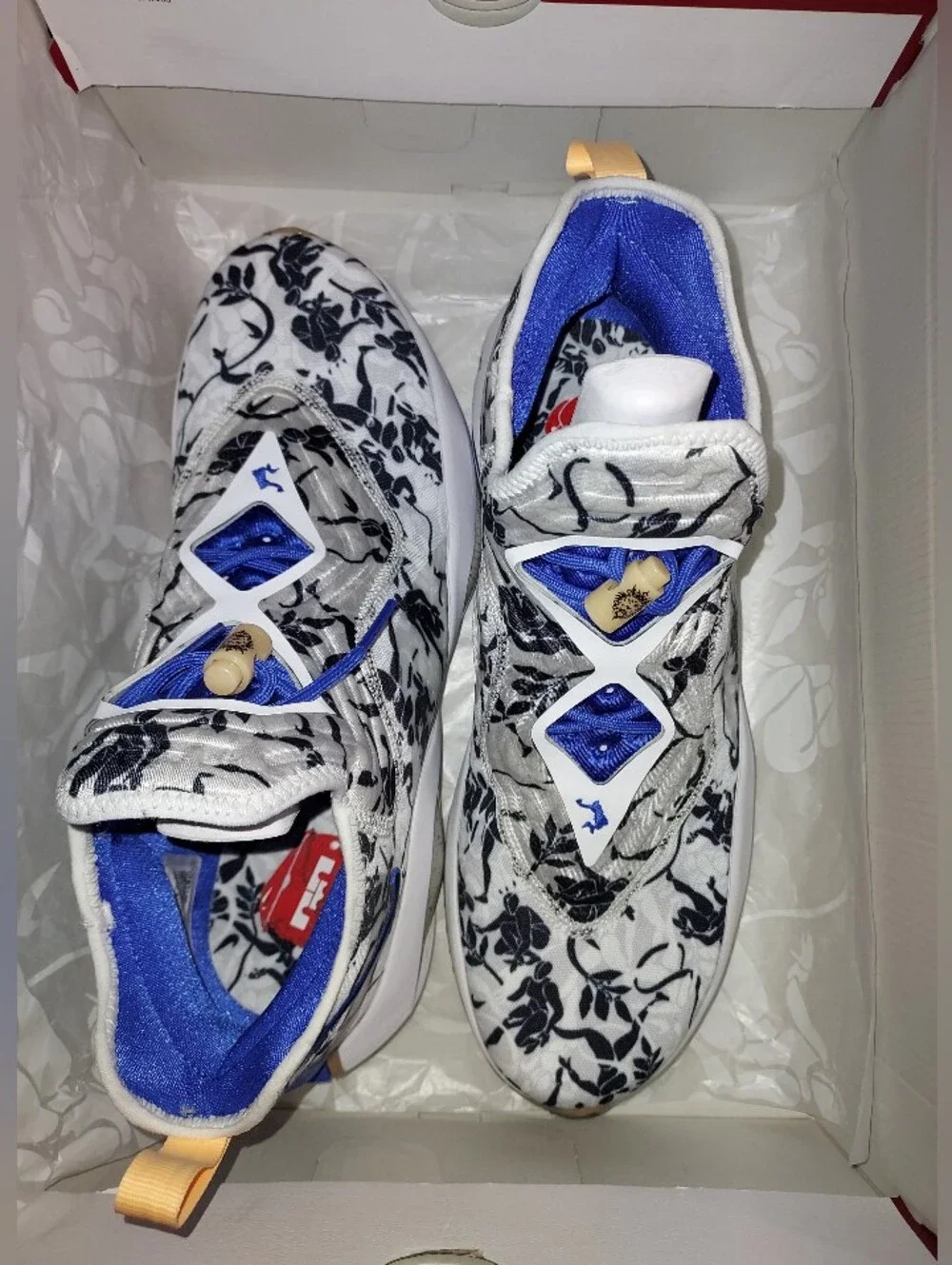 Nike Men’s White Floral Training Shoes with Black Print and Blue Details